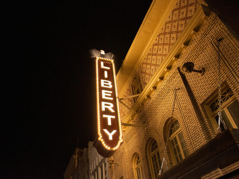 Liberty Theatre exterior at night