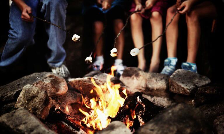 students around campfire
