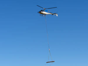 helicopter moving logs