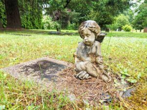 Angel statue on grave marker