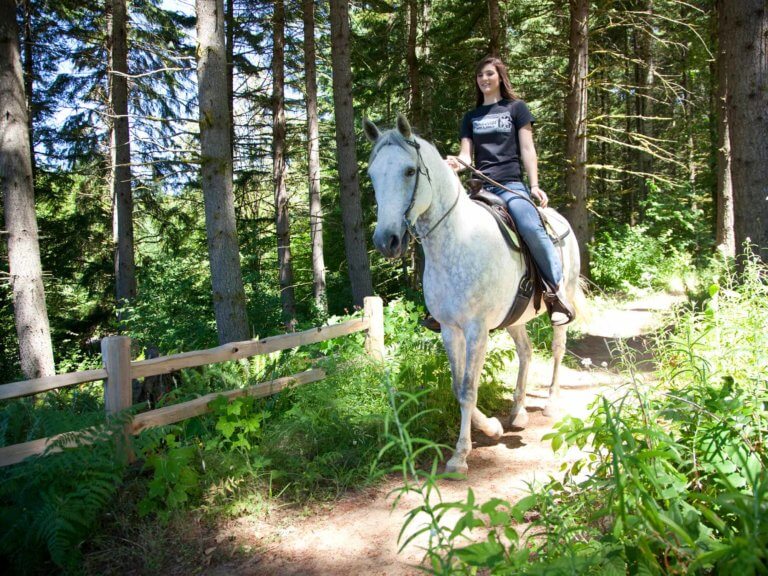 Woman riding horseback