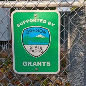 State Parks grants sign on fence