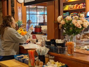woman ordering at South Falls Cafe counter