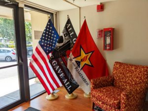 A display of flags in the lobby of the Tanner Project