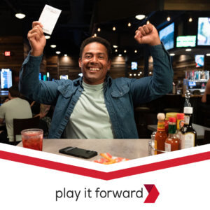 A man celebrate a megabucks win