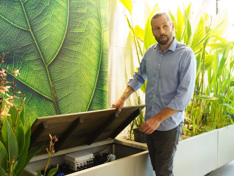 Adam displays the Smart Bench at LeapFrog Design headquarters.