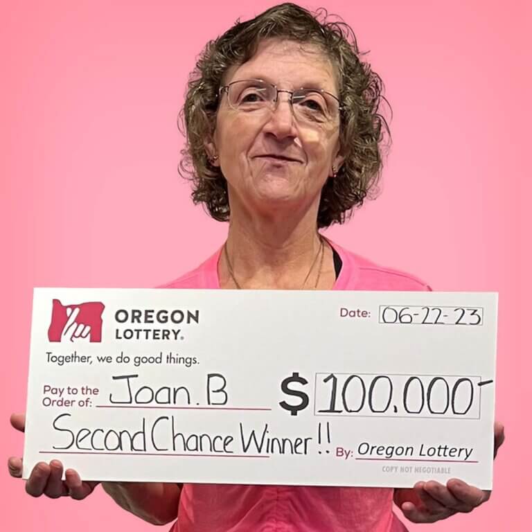 Woman holding check
